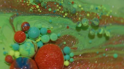 Colorful Paint Bubbles Floating in Liquid Background Abstract