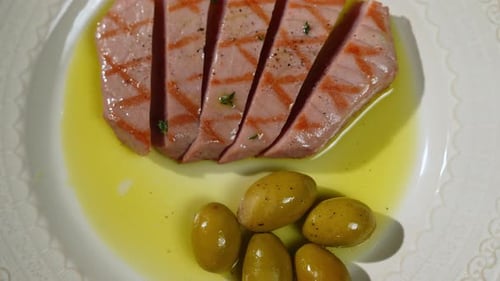 Grilled Tuna Steak with Olives Overhead Close Up