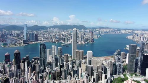 Hong Kong bay and skyline with skyscrapers view on a beautiful clear day, Aerial view.