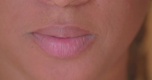 Mouth and Lips of Young Mixed Race Girl From Serious to Smiling Expression Close Up Full Frame Detai