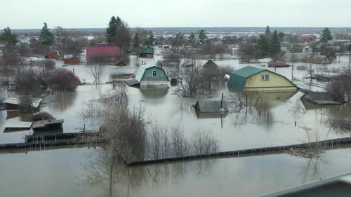 Homes Submerged in Floodwaters After Heavy Rain