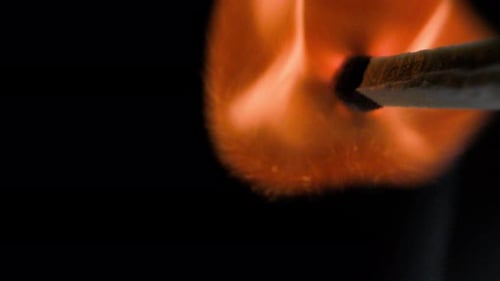 Match Ignites and Burns in Macro Shot