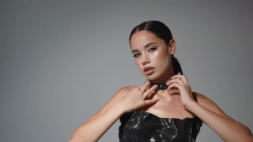 A Striking and Bold Fashion Portrait Featuring Black Accessories and EyeCatching Makeup
