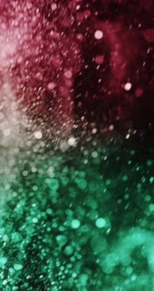 Flowing Red And Green Glittering Bokeh