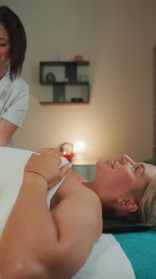 Woman Receiving Body Treatment at Modern Spa