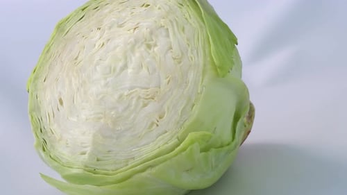 Close Up of Cut Cabbage on White Background