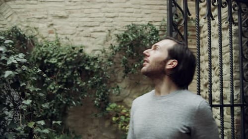 Three Amazed Italian Friends Walk Through a Gateway to See a Beautiful