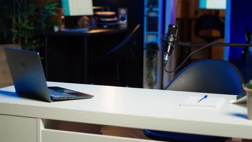 Laptop on Desk in Empty Home Production Studio