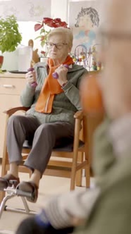 Senior Men and Women Exercising in a Nursing Home