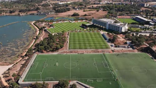 A Fourstadium Complex By a River