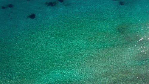 Sea Green Ocean Water in Sunshine Outdoors on Summer Day Drone View Calm Crystal Clear Mediterranean