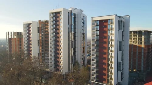 Aerial View of High Tower Crane and Residential Apartment Buildings Under Construction