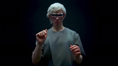 Young Adult Uses Virtual Reality Interface in Studio