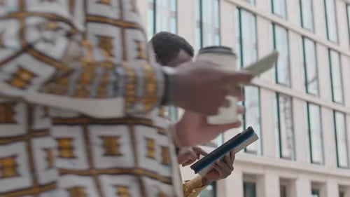 African American Man Using Tablet PC Outdoors