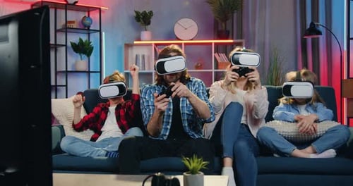 Family Enjoys Virtual Reality Gaming Together at Home