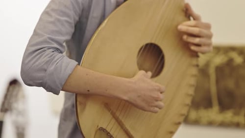 Close Up of Stringed Instrument Being Played