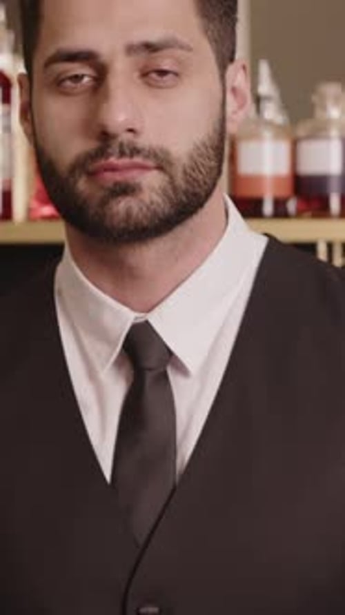 Vertical Portrait of Middle Eastern Bartender at Restaurant