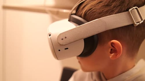 Boy Wearing Virtual Reality Headset, Close Up