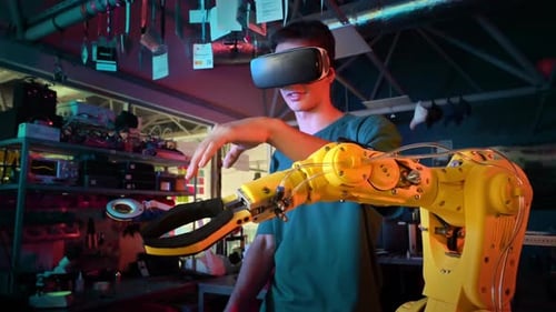 Young Adult Controlling Robotic Arm with Virtual Reality