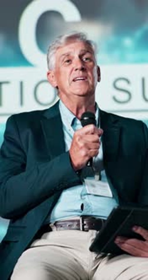 Man Presenting Information at a Conference