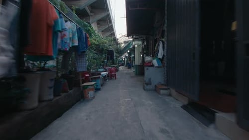 Parkourist Freerunning and Doing Flip in the Old Town Street