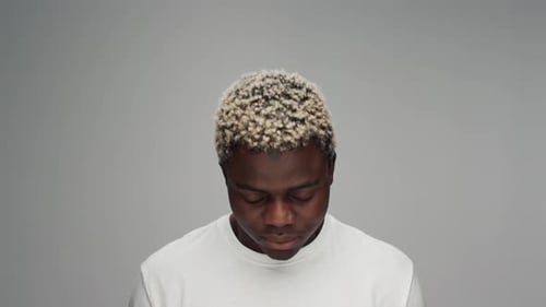 Young Adult Smiling Portrait on Neutral Background