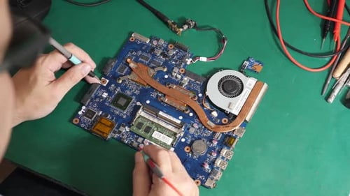 T110. During repair of the motherboard, testing is carried out. Repair and maintenance of computers.