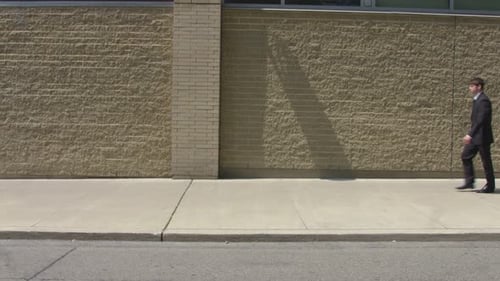man in the street with a phone