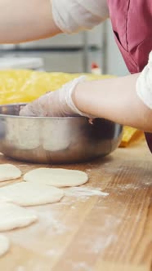 The Chef Prepares the Meat Filling for Pies in the