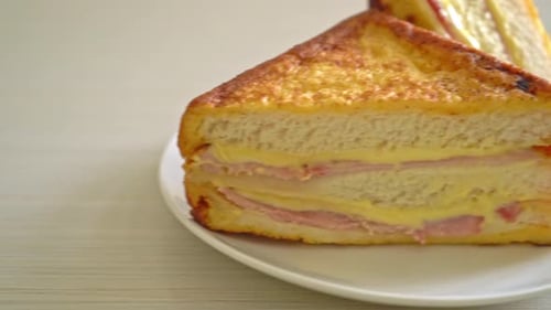 Grilled Ham and Cheese Sandwich Cut in Half