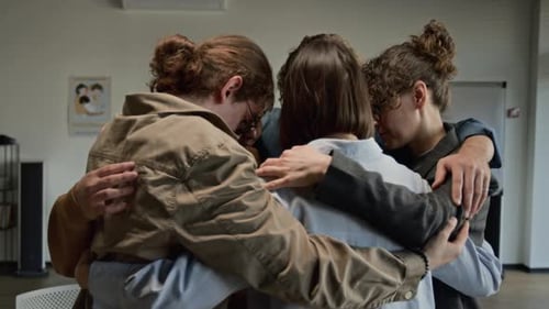 Diverse Group Hugging for Comfort during Therapy Session