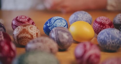 Woman Decorating Traditional Easter Eggs Using Old Traditional Technique