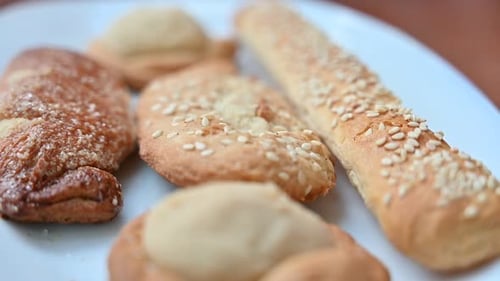 Delicious Baked Goods on White Plate Close-Up
