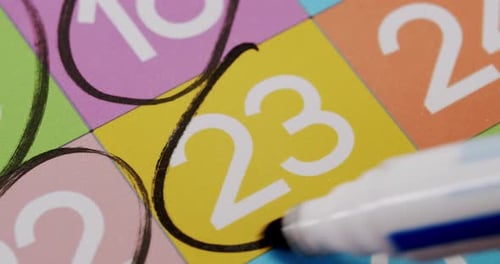 Black Marker Circles Twenty Three on Calendar