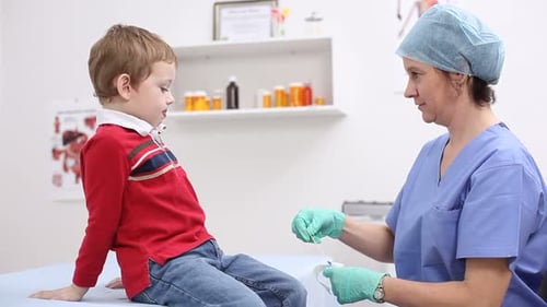 Young Boy Having Check Up at Doctor's Office