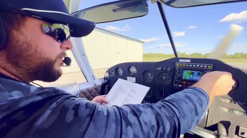 preflight checklist gone through by private pilot aboard a piper cherokee 180