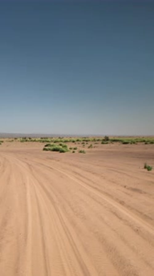 Driving in Sahara Desert Morocco in Vertical