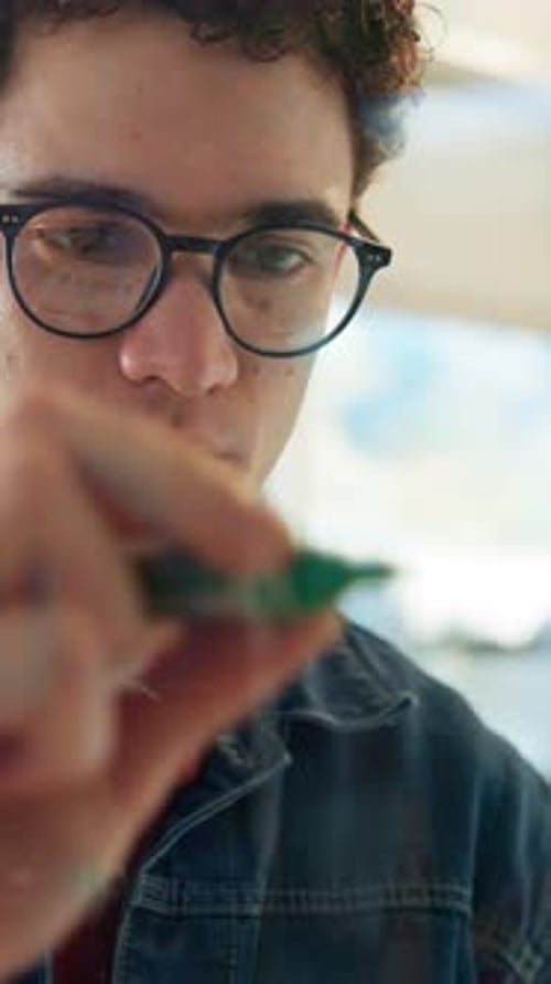 Glass, writing and man in office, planning and brainstorming for brand awareness