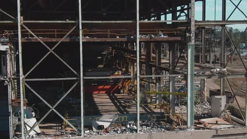 4k Aerial damaged building Drone closeup truck left to right shot