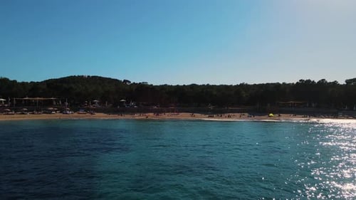 Aerial drone view of famous beach of Cala Bassa in ibiza, pitiusa island, Spain