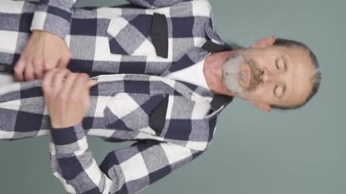 Man Buttons Up Flannel Shirt, Poses