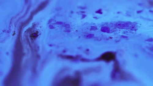 Abstract Flowing Blue and Black Fluid Texture