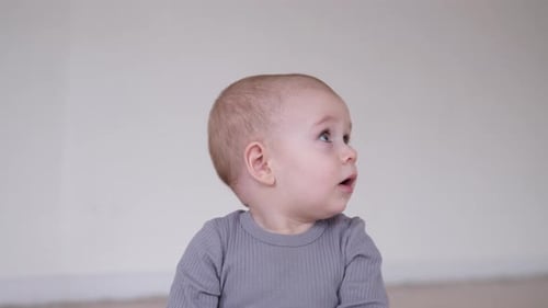 Adorable Baby Gaze with Big Blue Eyes