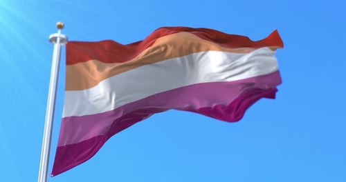 Lesbian Pride Flag Waving Against Clear Blue Sky
