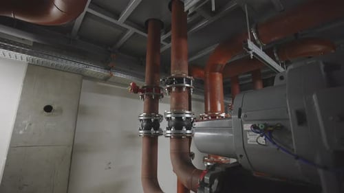 Complex Network of Pipes and Machinery Indoors