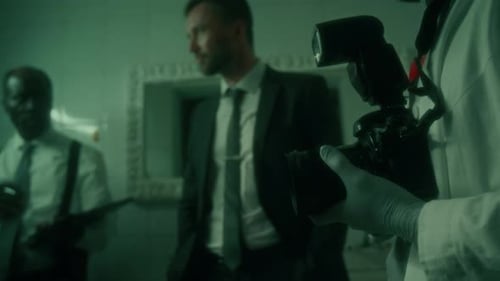 Investigators Examine Crime Scene Evidence