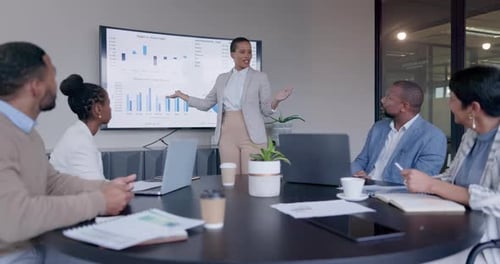 Team Presentation in Modern Office Conference Room