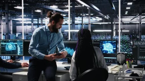 Data Center Engineering Team Collaborating on Neural Network Development