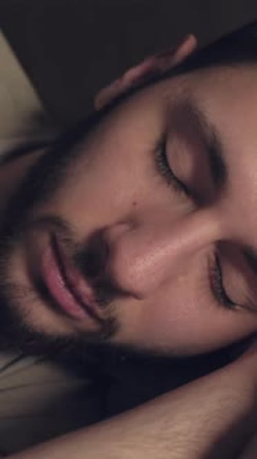 Young Adult Sleeping, Then Waking Up Indoors