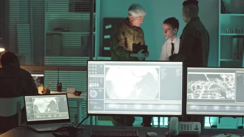 Military Surveillance Team Working in Central Office Hub